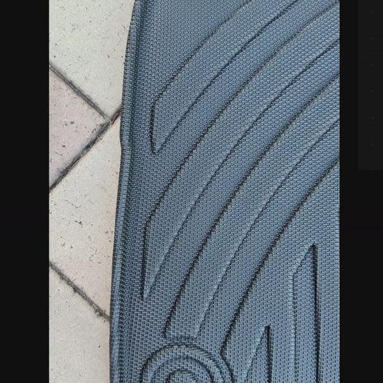 Close up BYD Shark 6 floor mats on brick Iron Devil brand