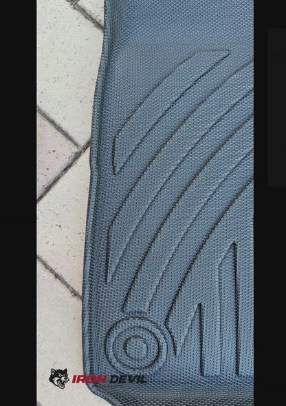 Close up BYD Shark 6 floor mats on brick Iron Devil brand