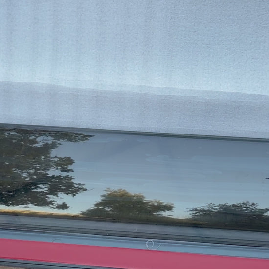 Close up of Iron Devil brand BYD Shark 6 window visor on tile